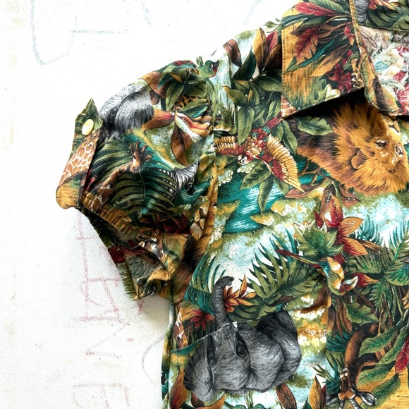 Green and brown jungle safari blouse with animal figures print. - Picture 5 of 8